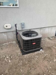 An outdoor Bryant air conditioning unit recently installed by ABT Heating and Cooling in Orem, UT.