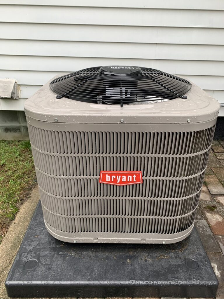 An outdoor Bryant air conditioning unit, installed or serviced by Proficient Heating & Cooling in Livonia, MI.