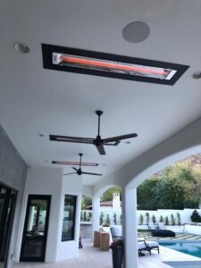 Outdoor ceiling fans and infrared heaters installed on a patio ceiling by EV Electric LLC in Mesa, AZ