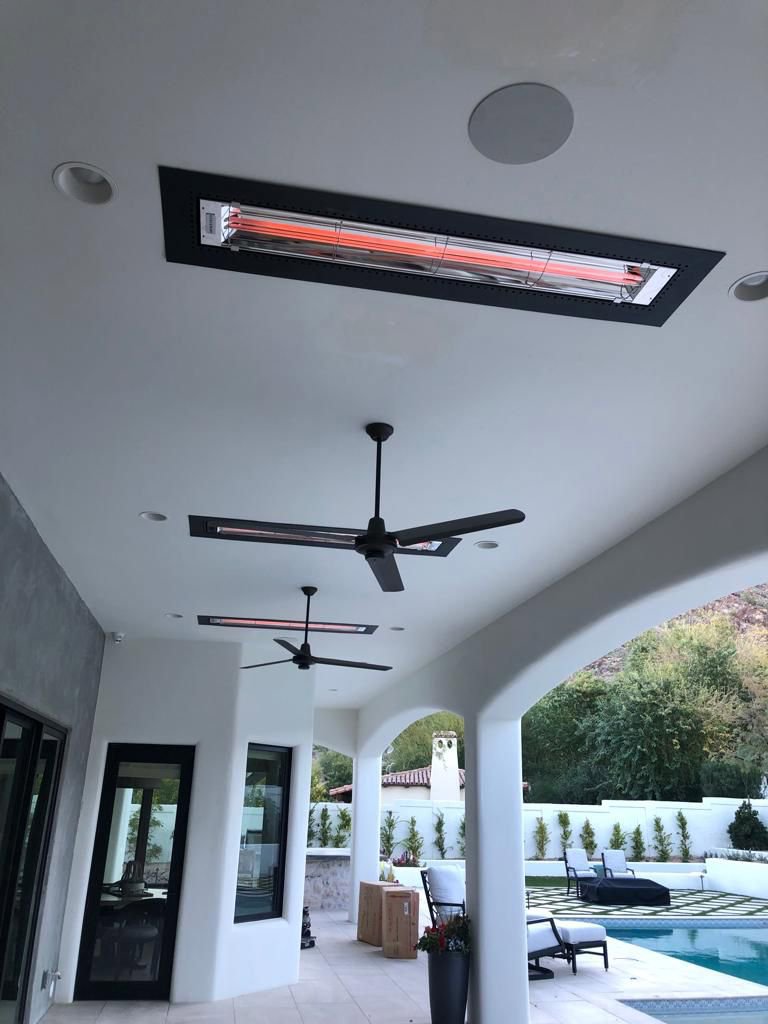 Outdoor ceiling fans and infrared heaters installed on a patio ceiling by EV Electric LLC in Mesa, AZ