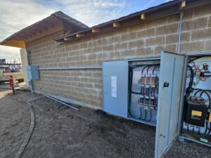 Large outdoor commercial electrical installation with multiple panels by B&C Electric LLC in Bakersfield, CA