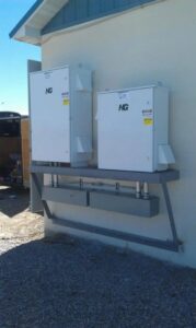 Large outdoor commercial electrical panels installed on a building by BlackRock Electrical in Pocatello, ID.