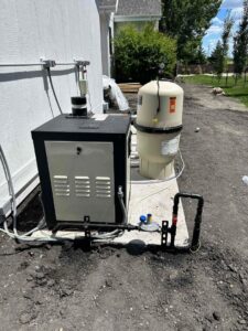 An outdoor commercial HVAC unit or pool heater installation by Precision Heating & Air Conditioning in Royersford, PA