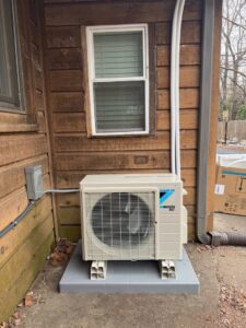 An outdoor Daikin mini-split condenser unit newly installed by Stanton Home Comfort in Fordland, MO.
