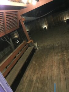 Outdoor deck area illuminated with string lighting installed by Olectric in Reno, NV.