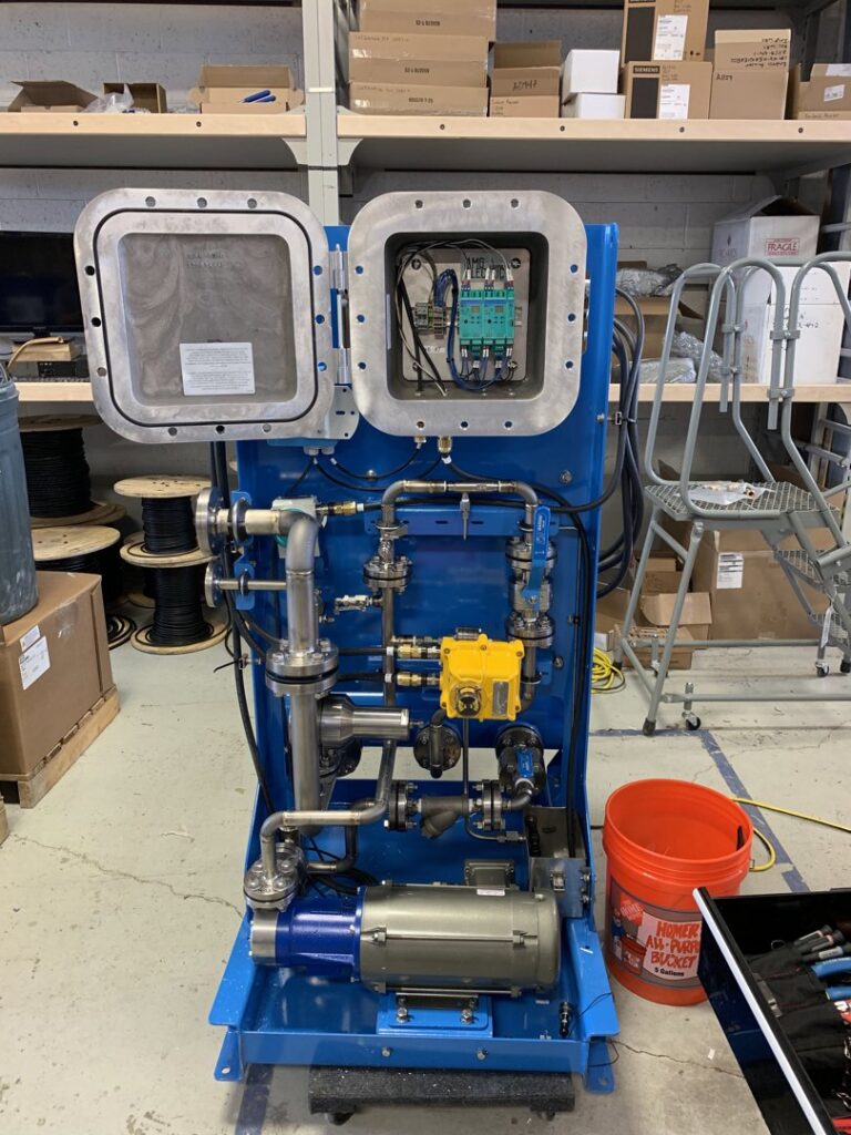 An open outdoor electrical breaker box showing internal wiring and circuit breakers by AMG Electric LLC Laramie, WY.