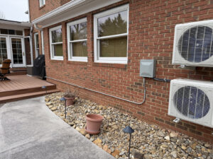 Outdoor electrical conduit and wiring for AC units by Power'd Up Electric, LLC in Clinton, TN.