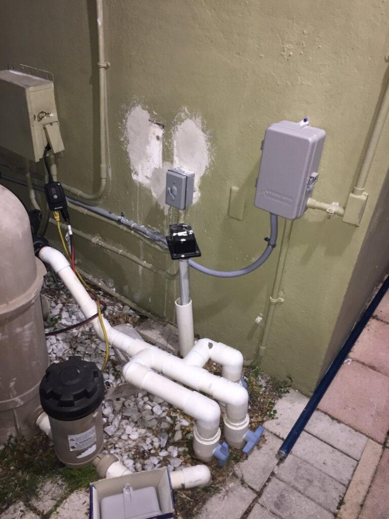 Outdoor electrical conduit and box installation for pool equipment by MG ELECTRIC INC in Lauderhill, FL