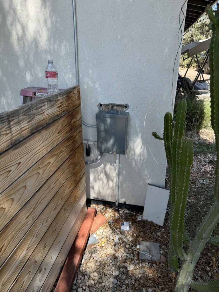 Outdoor electrical conduit and junction box installed on a building by MCM Electrical Services LLC in Phoenix, AZ