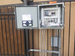 Outdoor electrical control panel with organized wiring and components installed by J&L Electric Inc. in San Antonio, TX