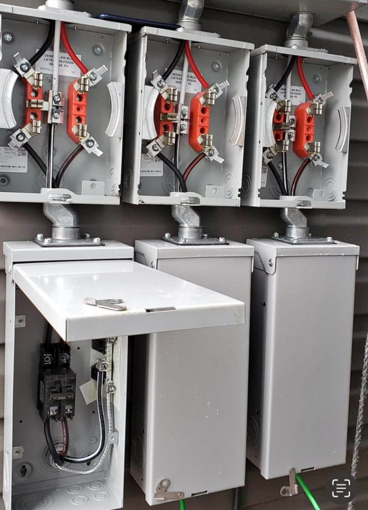 Outdoor electrical disconnects and meter bases installed by Spark Electric LLC in Kenai, AK.