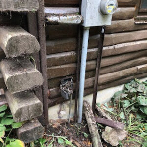 Outdoor electrical meter box and conduit on a building by Cherry Valley Plumbing and Electrical in Middleville, MI