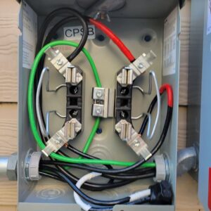Outdoor electrical meter box with wiring, showcasing professional work by Omni Power Electrical Services LLC in San Antonio, TX