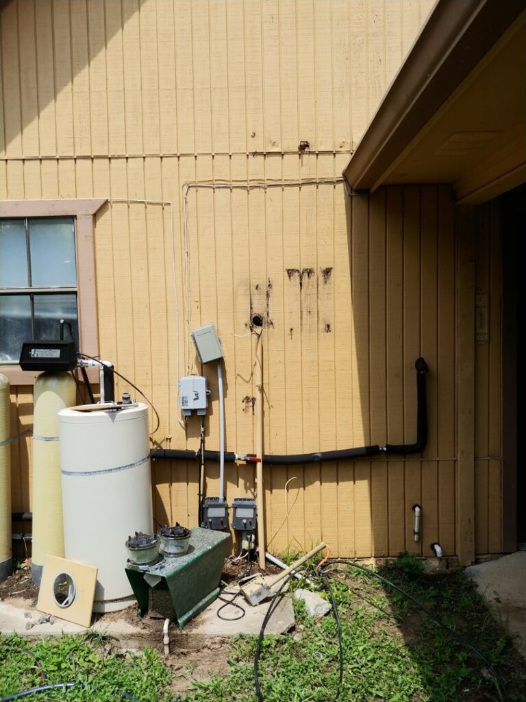 An outdoor electrical meter and disconnect switch installed by A Renewable Electric LLC in Houston, TX.