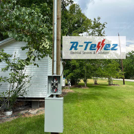 An outdoor electrical meter base and conduit installed on a utility pole by A-Tellez Electrical Services & Solutions L.L.C in Houston, TX.