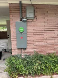 An outdoor electrical meter and service panel installed by Bonafide Electrical Services in Denham Springs, LA.