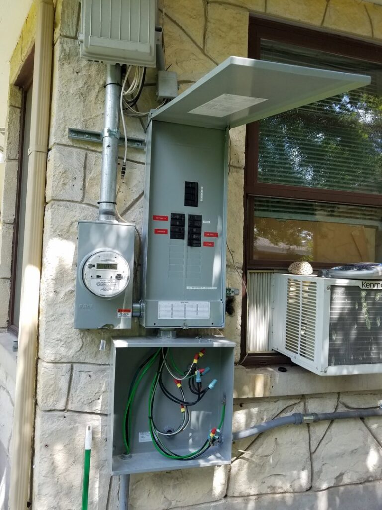 Outdoor electrical meter and main panel installation on a building by J&L Electric Inc. in San Antonio, TX