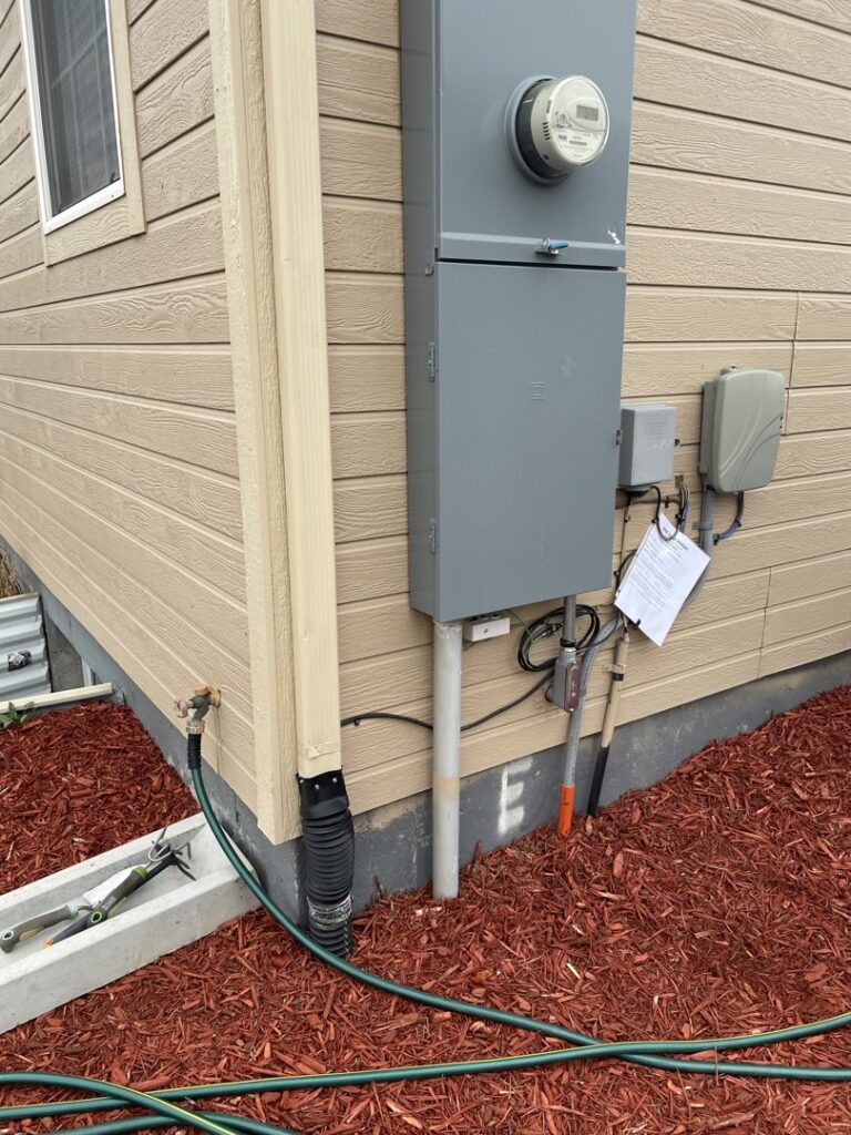 An outdoor electrical meter and service panel installed by P.H. Electric in Soulsbyville, CA.