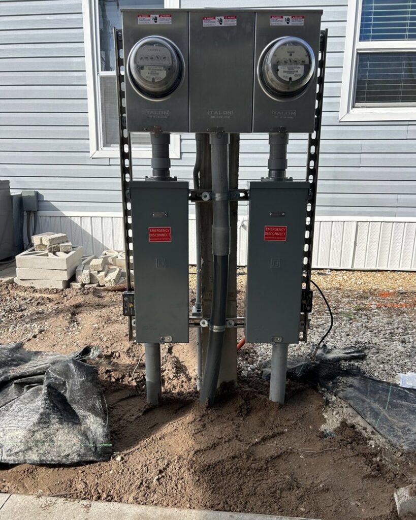 Outdoor electrical meter and service panel installation by Sound Electric LLC in Saint James City, FL.