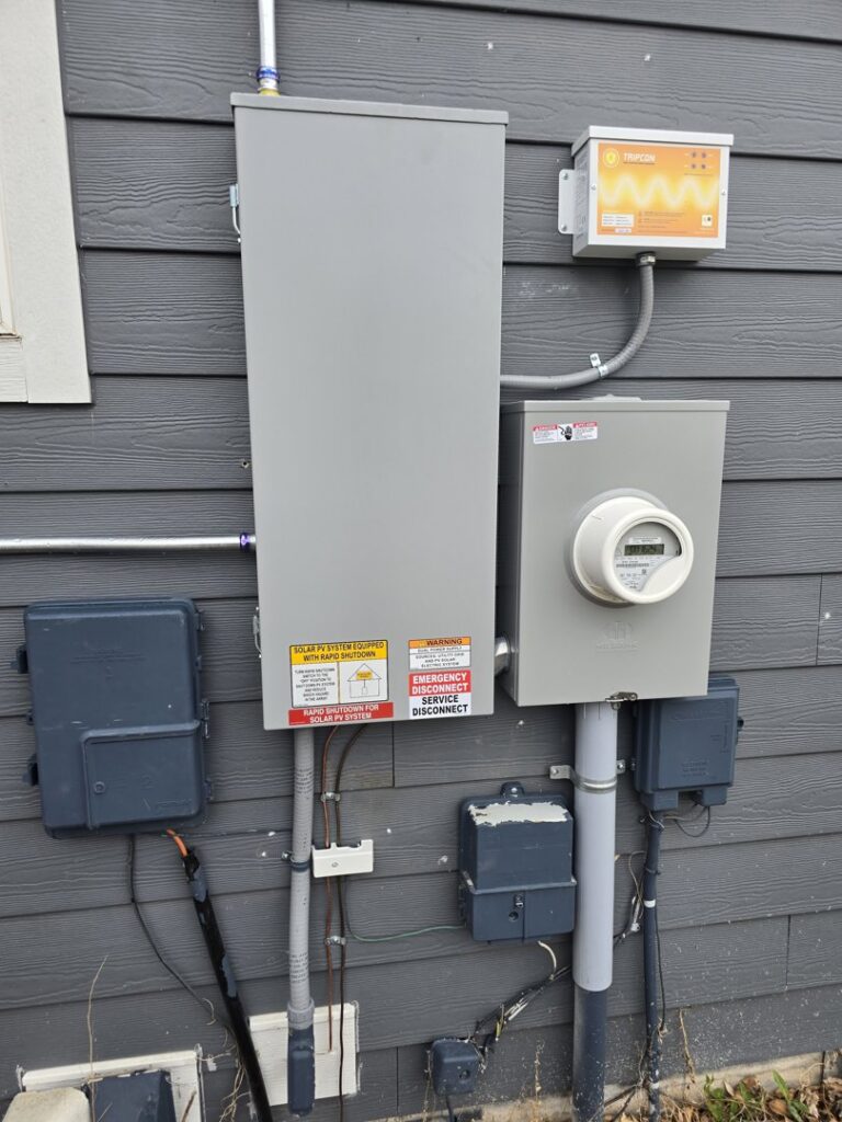 Outdoor electrical meter and solar PV system disconnects installed by Access Electrical in Indianapolis, IN.