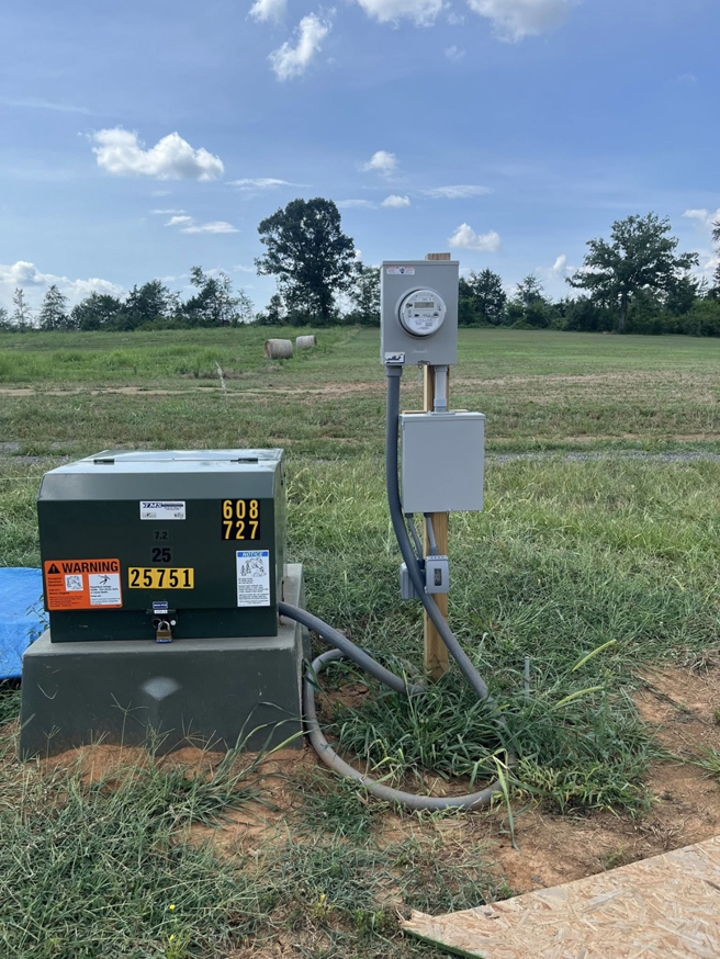 An outdoor electrical meter and transformer box installed by Mayflower Electric LLC in Knoxville, TN
