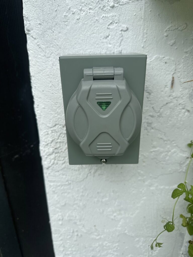 Outdoor heavy-duty electrical outlet installation for generator or RV by Ryno Electric in Cape Coral, FL