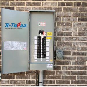 An outdoor electrical panel with an open door showing breakers, installed by A-Tellez Electrical Services & Solutions L.L.C in Houston, TX.