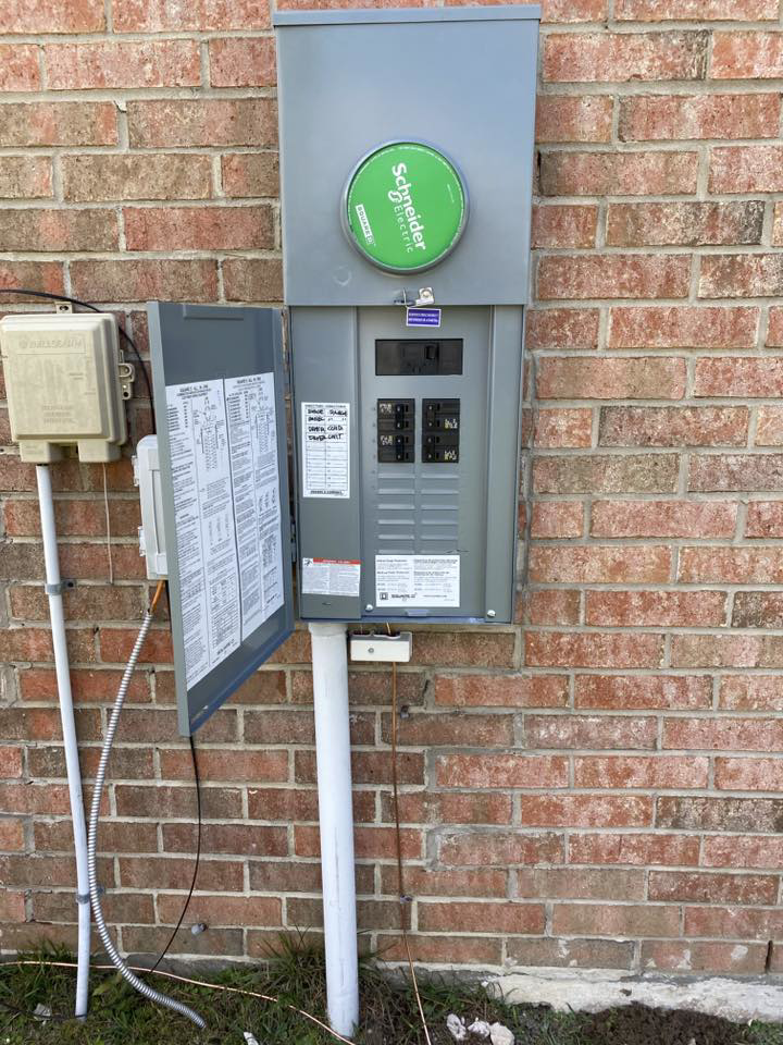 An open outdoor electrical panel and meter base installed by Southern Electrical Services, LLC in Leesburg, VA.