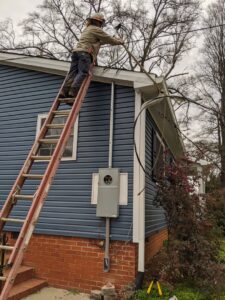 Outdoor electrical panel and wiring installation on a house by Starnes Electric LLC in Rock Hill, SC.