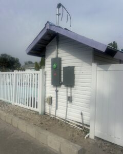 Outdoor electrical panels and conduit for pool equipment installed by Sound Electric LLC in Saint James City, FL.