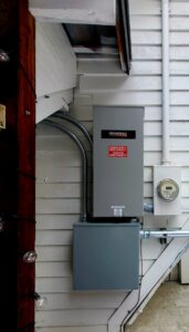 An outdoor electrical pedestal with conduits installed in a rural setting by 509 Electric in Yakima, WA.