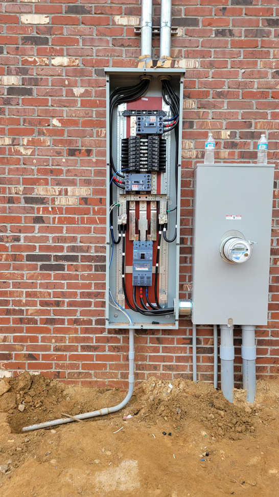 Outdoor electrical service panel and meter base installation by A.C. Electrical in Sumter, SC.