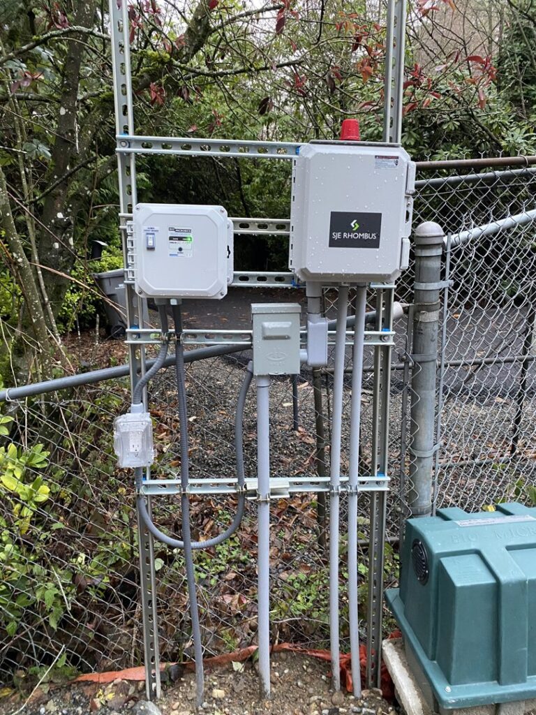 Complex outdoor electrical system with multiple enclosures and conduit installed by Good Contact Electric, LLC in Tacoma, WA.