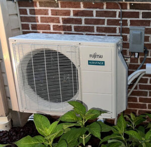 An outdoor Fujitsu Airstage mini-split condenser unit professionally installed by Alpine Pro Solutions in Allentown, PA.