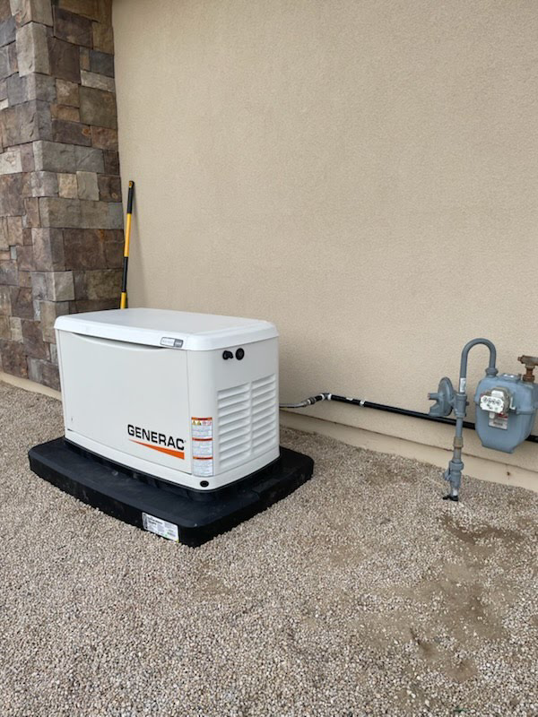 An outdoor Generac standby generator installation completed by Almighty Electric, Inc. in Yuma, AZ.