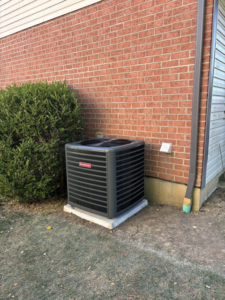 An outdoor Goodman air conditioning condenser unit installed by MK Home Services in Florence, KY.