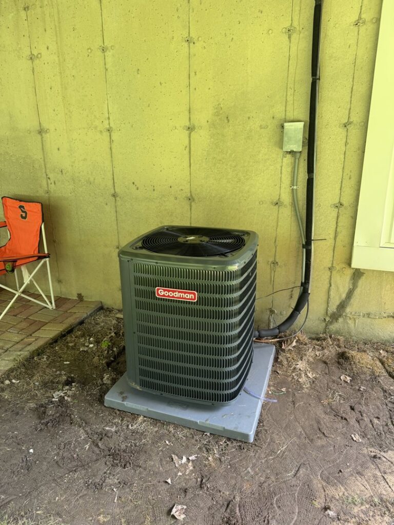 An outdoor Goodman air conditioning unit installed by Russell Climate Solutions in Schenectady, NY.
