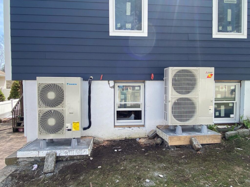 Newly installed outdoor heat pump and AC units by Enviromax Heating & Cooling in Peekskill, NY.