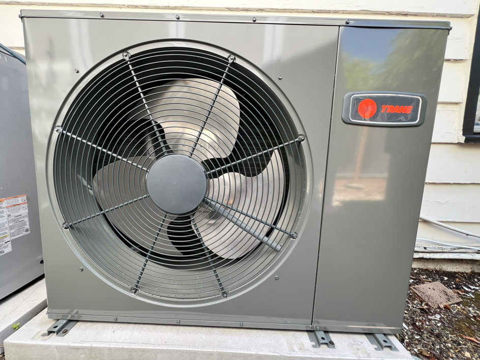 An outdoor Trane heat pump or mini-split condenser unit installed by A and R Air Conditioning & Heating furnace in San Jose, CA.