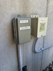 Outdoor electrical disconnect for a hot tub and pool light transformer installed by Rudis Electrical LLC in Scranton, PA.