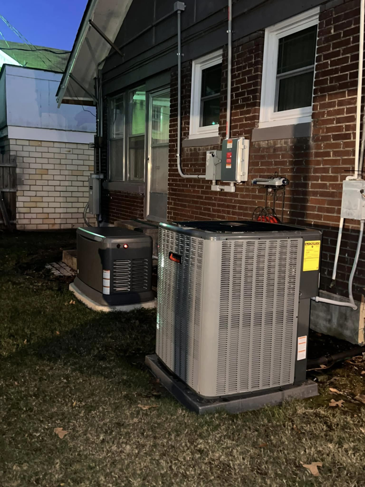 An outdoor HVAC condenser unit installed next to a generator by Smartcool Inc. in Pine Bluff, AR.