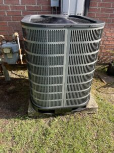 An outdoor HVAC condenser unit installed by Elite Heat & Air in Monroe, LA, ready for operation.