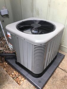 A modern outdoor HVAC condenser unit installed by The A/C Guy in Shreveport, LA.