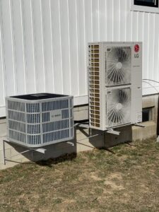 Newly installed outdoor HVAC condenser units by Pacifico Heating and Cooling in Shadyside, OH.