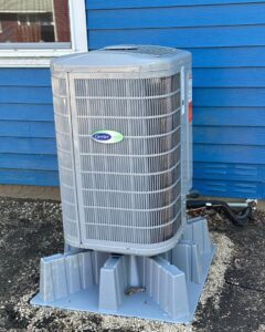 A newly installed Carrier outdoor HVAC unit by A All Temp Inc. Heating & Cooling in Naperville, IL.