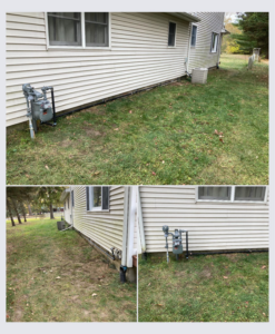 An outdoor HVAC condenser unit on the side of a residential home by S & K Solutions in Petersburg, MI