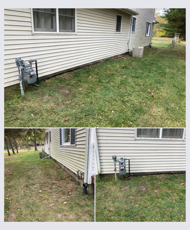 An outdoor HVAC condenser unit on the side of a residential home by S & K Solutions in Petersburg, MI