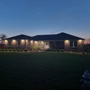 A beautiful residential exterior with professionally installed outdoor landscape lighting by TCB Electric LLC in Elizabethtown, KY.