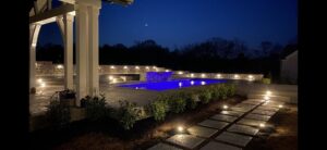 Beautiful outdoor landscape and pool lighting installed by Omilian Electric Inc. in Murfreesboro, TN