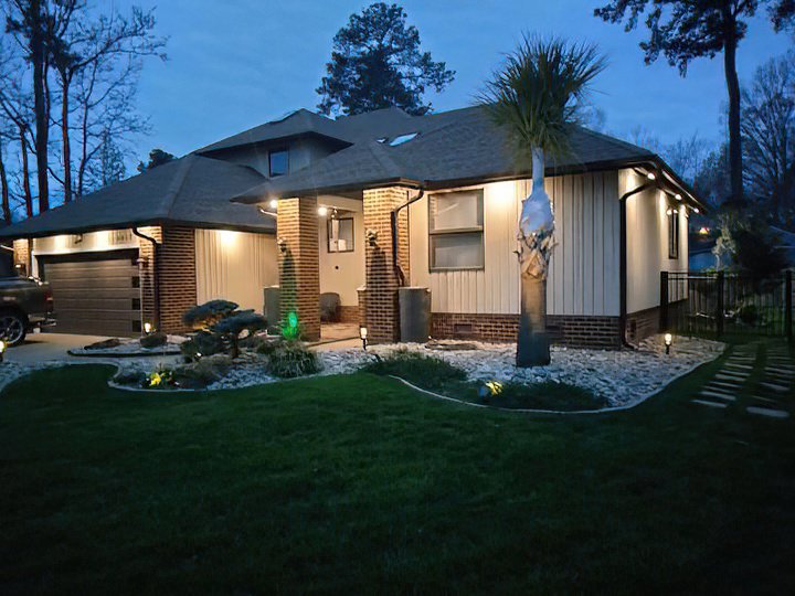 Beautiful outdoor landscape and soffit lighting installed by Fresh Start Electrical, LLC in Newport News, VA